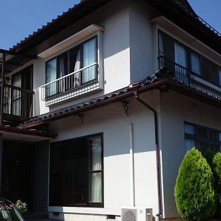 Guest House Minna No Ie Achi Bagian luar foto