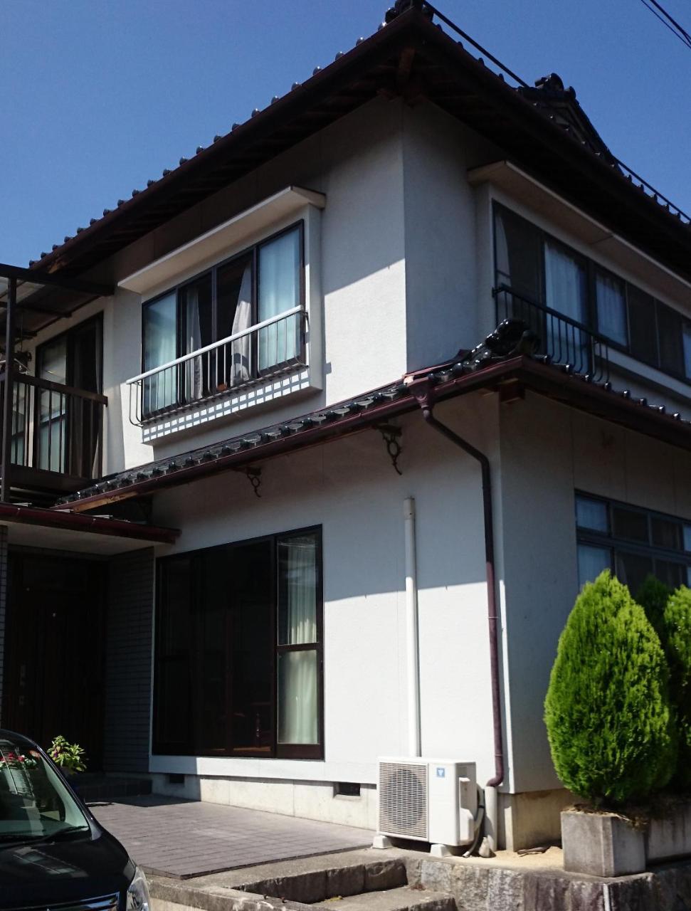 Guest House Minna No Ie Achi Bagian luar foto