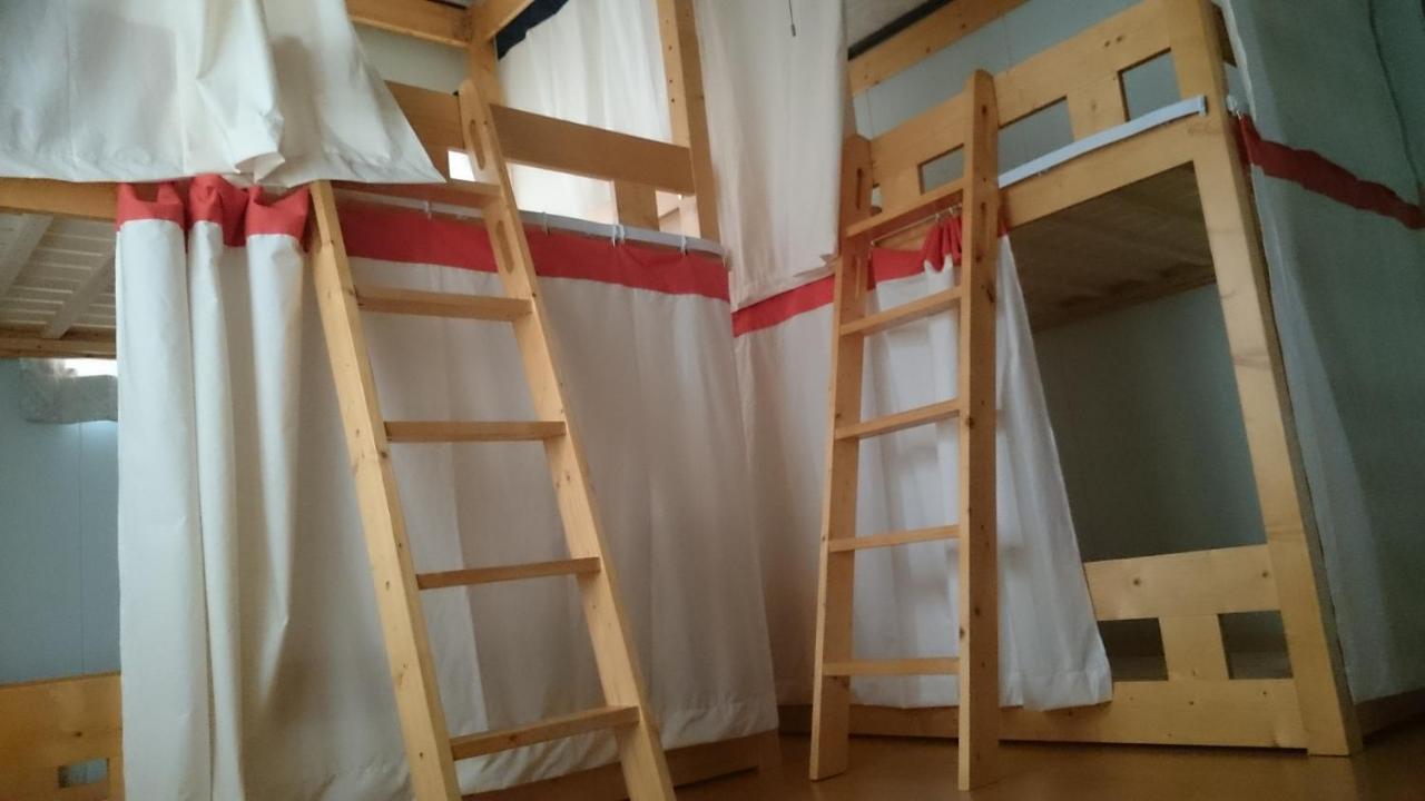 Guest House Minna No Ie Achi Bagian luar foto