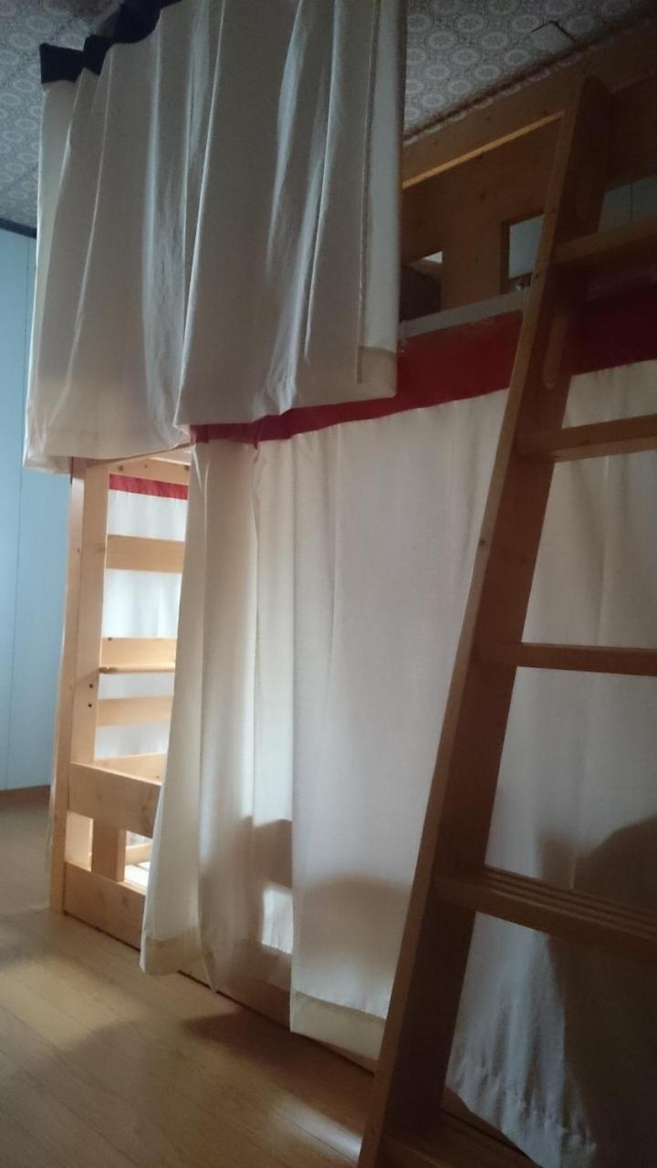 Guest House Minna No Ie Achi Bagian luar foto