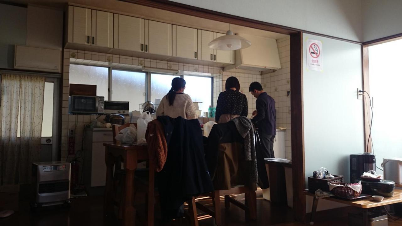 Guest House Minna No Ie Achi Bagian luar foto